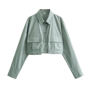 Detailed flat lay of sage green cropped long sleeve shirt with utility chest pockets