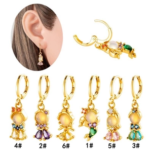 Gold hoop earrings with colorful zircon astronaut charms in multiple styles and colors