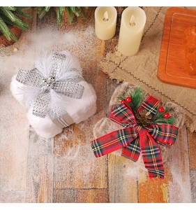 Detail of plush Christmas gift box ornaments with faux fur and sequin ribbon accents