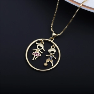 Close-up of gold necklace with heart silhouette boy and girl pendant and colored stones
