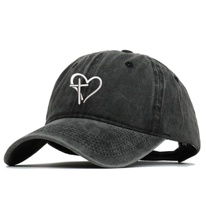Washed black cotton baseball cap with silver metallic heart and cross embroidery