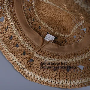 Detail of adjustable inner strap and 100% paper fiber weave on women straw hat