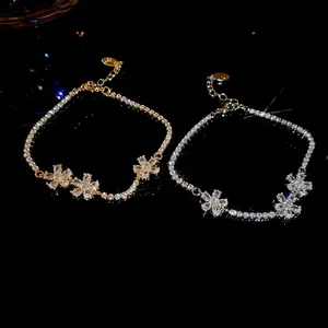 Sparkling zircon flower pendant tennis bracelets in gold and silver plating