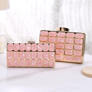 Pink marble acrylic dinner clutches with gold metal frames in two sizes for women