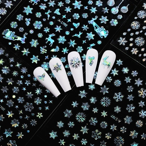 Holographic Christmas nail art stickers with laser gold snowflakes and reindeer patterns