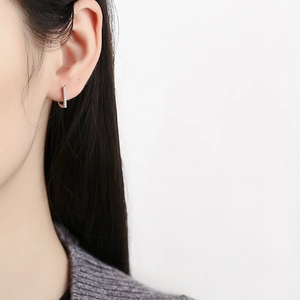925 sterling silver D-shaped hoop earrings with sparkling pave-set cubic zirconia stones