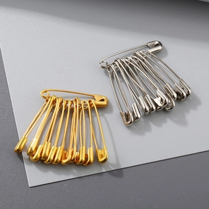 Bulk gold and silver steel safety pins for clothing neckline and cuff fastening