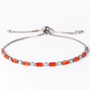 Detail of silver bracelet with orange rectangular gems and adjustable slide clasp