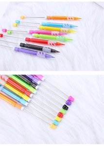 Detail view of colorful DIY beadable pens with stainless steel rods and safety caps