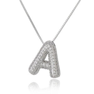 Silver letter A pendant necklace with white zircon pavé and box chain on white background