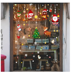 Double-sided Christmas window stickers featuring reindeer and penguin patterns for glass