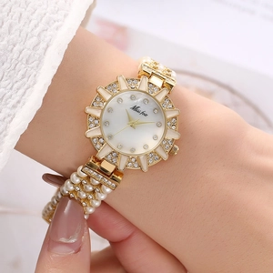 Elegant gold quartz watch with pearl bead strap and sparkling rhinestone dial for women
