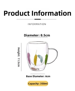 Detail view of a 350ml double-wall glass mug with colorful feathers and transparent handle