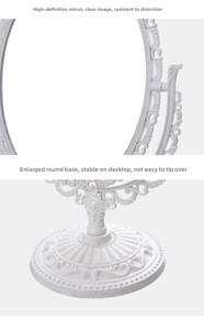 Detail of white vintage desktop makeup mirror with embossed pattern and sturdy round base