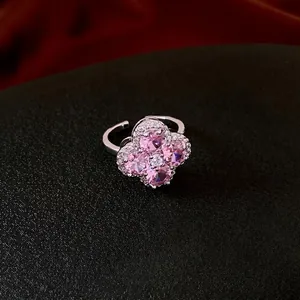 Pink zircon four-leaf clover open ring in silver finish with sparkling crystal accents