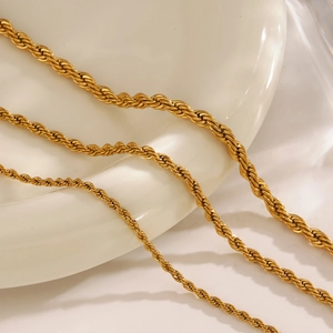 Three sizes of golden stainless steel rope chain bracelets with a polished twisted finish