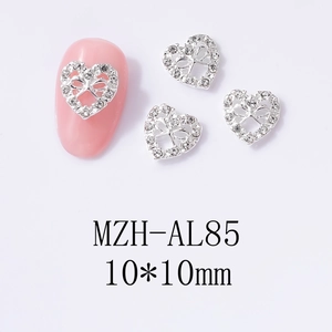 Dettaglio di ciondoli per unghie a cuore in argento con fiocco di strass, 10x10mm