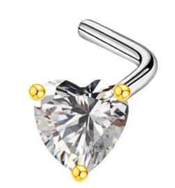 Macro shot of L-shaped heart nose stud with clear zircon stone and silver steel post