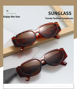 Detail view of tortoiseshell and brown cat eye sunglasses with stylish notch design