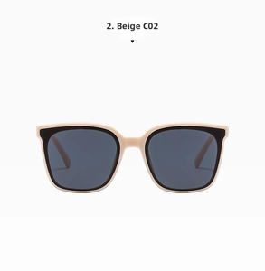 Detail shot of beige thick-frame sunglasses with dark lenses for a slimming look