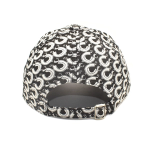 Detail view of the adjustable metal buckle and geometric pattern on the baseball cap back