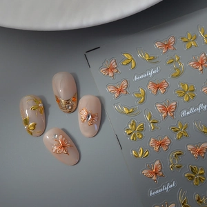3D embossed butterfly nail stickers with golden outlines and floral diamond accents