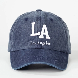 Navy blue washed denim baseball cap with white LA embroidery and Los Angeles text