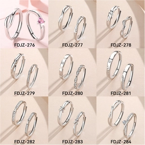Collection of nine S925 sterling silver couple rings with pink heart zircon and knot designs