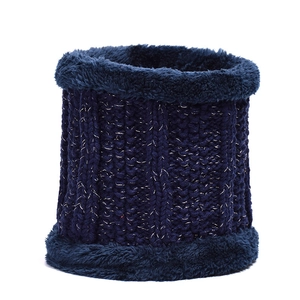 Detailed close-up of blue knitted winter neck warmer with soft fleece lining and metallic yarn