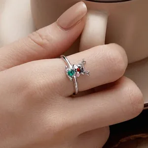 Festive Christmas reindeer open ring with green heart gemstone and red enamel nose