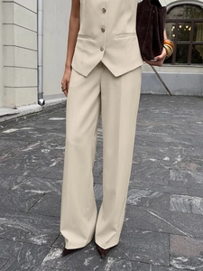 Beige tailored vest and wide-leg trousers suit with gold buttons for elegant office wear