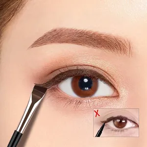 Angled eyeliner brush with synthetic bristles for precise winged lines and eye makeup