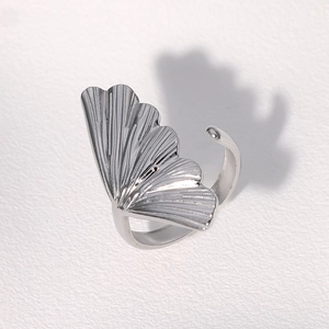 Detailed view of silver ginkgo leaf ring showing intricate vein textures and open band