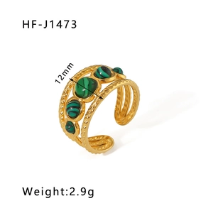 Detail view of 18k gold plated stainless steel ring with green malachite stones, 12mm width