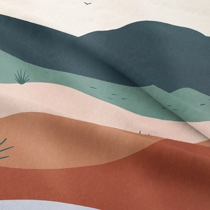 Detail showing the velvet texture and abstract landscape print of the tapestry