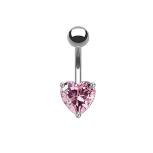 Macro detail of curved silver bar with a pink heart-shaped zircon gemstone setting