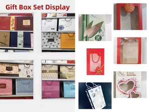Detailed view of various gift boxes for cotton bath towels in multiple colors and styles