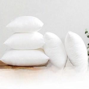 Detail of five square cushion inserts showing high-elasticity PP cotton filling and soft white fabric