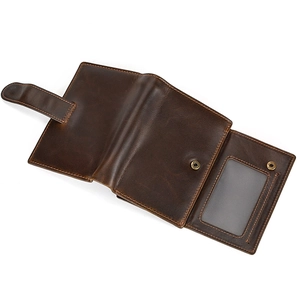 Detail view of genuine leather wallet interior with card slots and transparent photo window