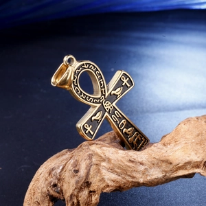 Hip hop gold and black Ankh cross pendant necklace for men on a professional wood background