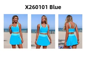 Detailed views of the blue two-piece tankini swimsuit set with A-line skirt on a beach