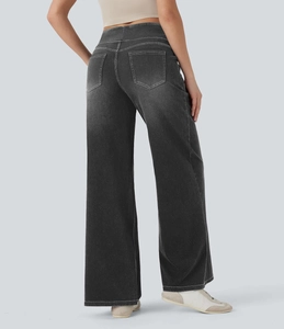 Rückansicht der High-Waist-Jeans mit weitem Bein in Dunkelgrau und weißen Kontrastnähten