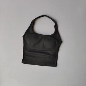 Detail view of vertical ribbed texture on seamless square neck halter yoga crop top