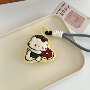 Close-up of cute cartoon cat embroidery keychain with woven rope and yellow hook