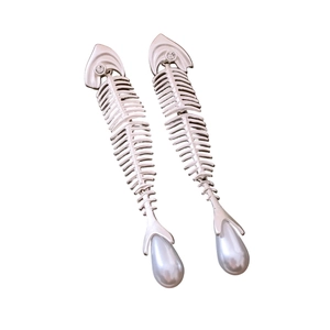 Silver fishbone earrings with sparkling zircons and a white pearl drop on white background