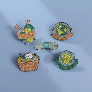 5pcs cute cat and knitting enamel pin set with handmade theme on light blue background