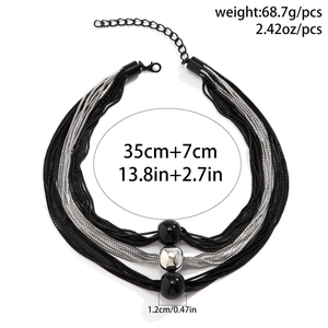 Detail view of multilayer punk chain choker showing 68.7g weight and 35cm length scale