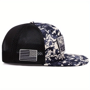 Tactical camouflage trucker hat with American flag embroidery and breathable mesh back