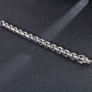 Mens thick D-link chunky chain bracelet in silver titanium steel on black background