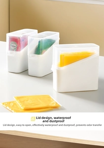 Detail view of stackable cheese slice storage boxes with transparent lids for fridge